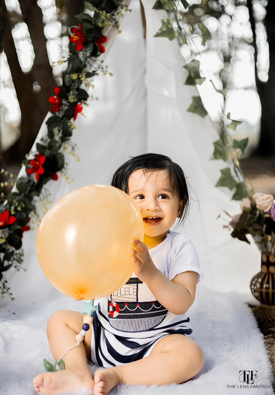 Adorable baby boy pre birthday shoot with pastel balloons by The Lens Fantasy Photography