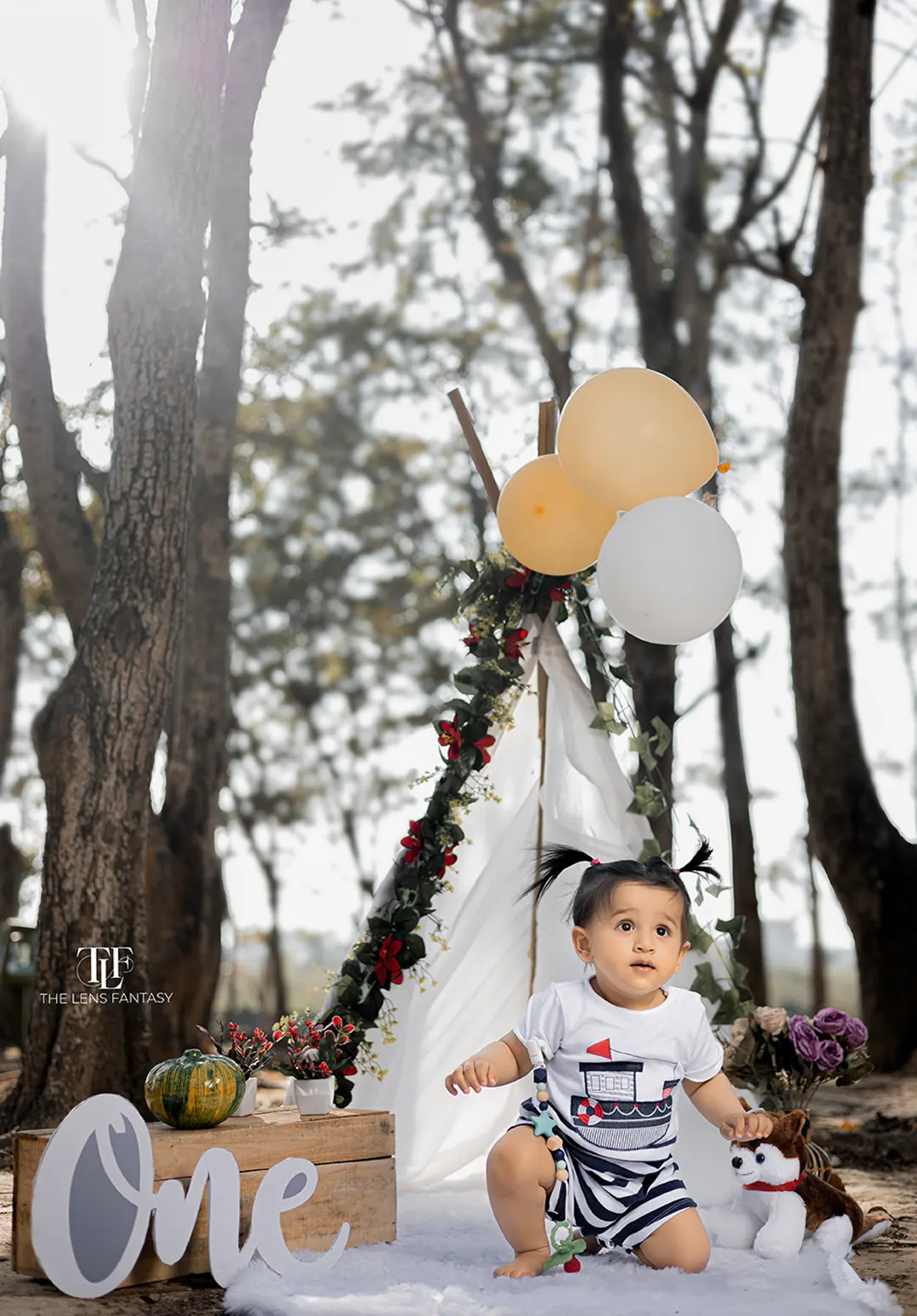 Adorable baby boy pre birthday shoot with pastel balloons by The Lens Fantasy Photography