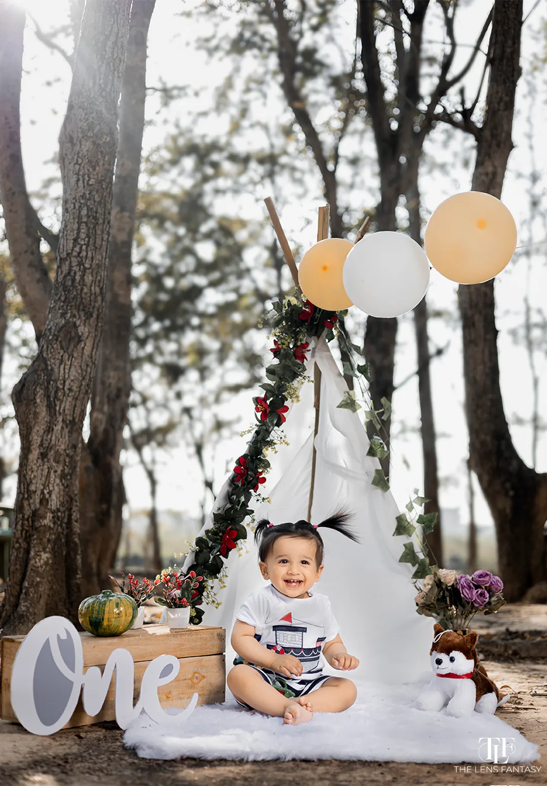 Adorable baby boy pre birthday shoot with pastel balloons by The Lens Fantasy Photography